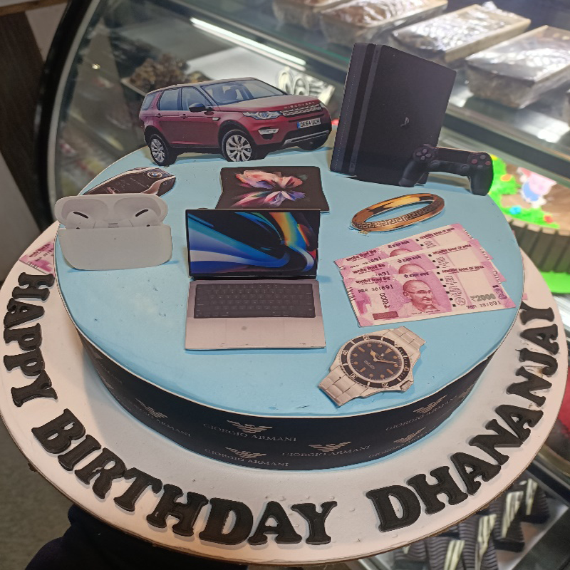 Car, laptop, money, theme cake