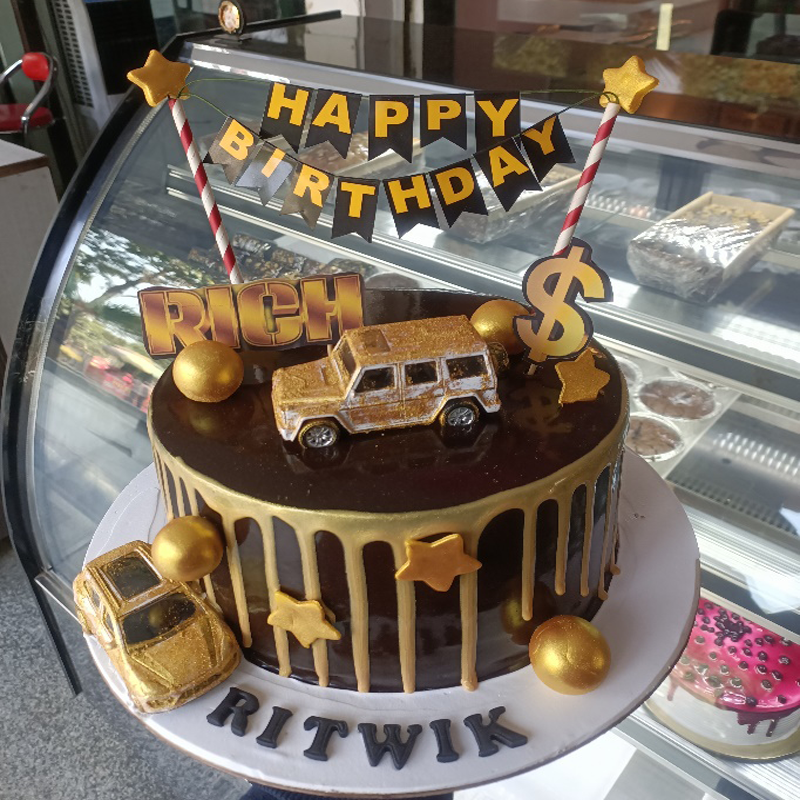 Golden car theme cake