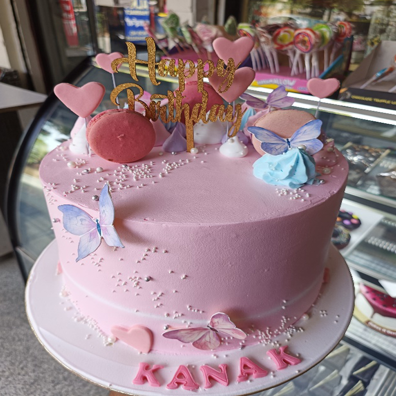 Pink Butterflies and macroons theme cake