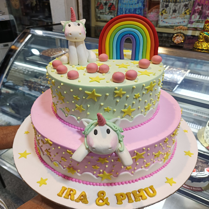 Unicorn theme cake with rainbow